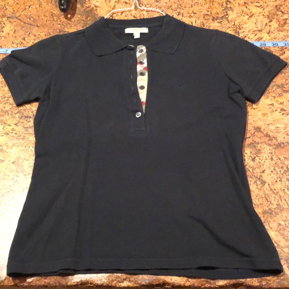 Burberry polo 👚 size S.